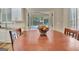 Kitchen view that transitions to a sunroom and reveals a view of the in-ground pool at 500 Merrill Ln, Peachtree City, GA 30269