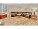 Comfortable living room with a dark leather sectional sofa and a decorative wooden chest at 500 Merrill Ln, Peachtree City, GA 30269