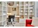 Bright office with built-in bookshelves, a desk, and a swivel chair at 500 Merrill Ln, Peachtree City, GA 30269