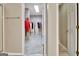 View of a spacious walk-in closet, complete with plenty of hanging racks, shelves, and storage space at 500 Merrill Ln, Peachtree City, GA 30269