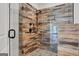 Stylish bathroom shower featuring updated tiling and modern shower fixtures at 940 Planters Pl, Loganville, GA 30052