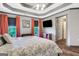 Bedroom features hard floors, trey ceilings, and large windows providing natural light at 940 Planters Pl, Loganville, GA 30052