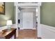 Elegant foyer with hardwood floors and traditional design at 940 Planters Pl, Loganville, GA 30052