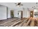 Beautiful kitchen area with hardwood floors, stainless fridge, and custom accents at 940 Planters Pl, Loganville, GA 30052