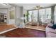 Bright living room with hardwood floors and large windows at 940 Planters Pl, Loganville, GA 30052