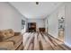Comfortable living room with hardwood floors, natural light, and neutral colors at 940 Planters Pl, Loganville, GA 30052