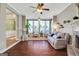 Bright living room with hardwood floors and large windows at 940 Planters Pl, Loganville, GA 30052