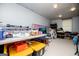 Unfinished basement space with storage containers and other items at 258 Big Oak Rd, Whitesburg, GA 30185