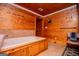 Large tub with wood accents, tile flooring, wood paneled walls, and a soothing message at 258 Big Oak Rd, Whitesburg, GA 30185