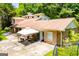 Aerial view of a charming home with a covered patio and a spacious backyard at 258 Big Oak Rd, Whitesburg, GA 30185