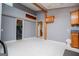 Spacious kitchen area featuring wood cabinets, gray walls and bright white floors at 258 Big Oak Rd, Whitesburg, GA 30185