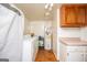 Functional laundry area with washer, dryer, and water heater at 258 Big Oak Rd, Whitesburg, GA 30185