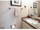 Well-maintained bathroom featuring a vanity with granite countertops at 165 Longshore Way, Fayetteville, GA 30215