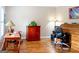Bright office space with hardwood floors, a desk and multiple light sources at 165 Longshore Way, Fayetteville, GA 30215