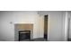 Living room showing a brick fireplace with a white mantel at 2916 Memorial Se Dr, Atlanta, GA 30317