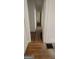 Hallway with hardwood floors, leading to other rooms at 2916 Memorial Se Dr, Atlanta, GA 30317