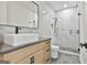 Modern bathroom featuring a vanity with vessel sink, glass shower, and sleek fixtures at 1240 Hayes Sq, Peachtree City, GA 30269
