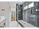 Stylish bathroom with frameless glass shower, neutral-toned tiles, and modern fixtures at 1240 Hayes Sq, Peachtree City, GA 30269