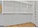 Walk-in closet featuring built-in shelving and hanging rods for maximum storage at 1240 Hayes Sq, Peachtree City, GA 30269