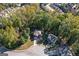Aerial view of the property showcasing surrounding trees and neighborhood at 475 Louise Way, Locust Grove, GA 30248