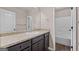Bathroom with sink, vanity, and framed mirror at 475 Louise Way, Locust Grove, GA 30248