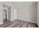 Bedroom with neutral walls and hardwood flooring at 475 Louise Way, Locust Grove, GA 30248