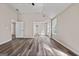 Large main bedroom featuring an ensuite bathroom, wood-look flooring, and recessed lighting at 475 Louise Way, Locust Grove, GA 30248