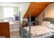 Finished basement featuring a sleeping area, TV, and work station at 4076 Airline Rd, Mcdonough, GA 30252