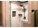 Modern bathroom featuring a shower with black hardware and tiled alcove at 4076 Airline Rd, Mcdonough, GA 30252
