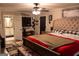 Spacious bedroom featuring a ceiling fan, and an en suite bathroom at 4076 Airline Rd, Mcdonough, GA 30252