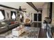 Comfortable living room featuring plush seating, a ceiling fan, and stylish decor at 4076 Airline Rd, Mcdonough, GA 30252