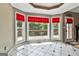 Charming breakfast nook with bay window and access to a deck, providing a relaxing dining space at 135 Rockglen Ct, Fayetteville, GA 30215
