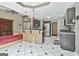 Open kitchen and living area with modern appliances and ample counter space, great for gatherings at 135 Rockglen Ct, Fayetteville, GA 30215