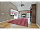 Bright living room boasts vaulted ceilings, fireplace, and an open floor plan, great for entertaining at 135 Rockglen Ct, Fayetteville, GA 30215