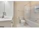 Bathroom featuring a white vanity with mirror, toilet, bathtub and shower combo at 488 N Jeff Davis Dr, Fayetteville, GA 30214