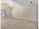 Bedroom featuring neutral carpet, a decorative ceiling, and a window for natural light at 488 N Jeff Davis Dr, Fayetteville, GA 30214