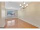 Bright dining room featuring a decorative ceiling, hardwood floors and natural light from a window at 488 N Jeff Davis Dr, Fayetteville, GA 30214