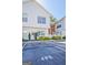 Charming two-story townhouse featuring white siding, well-kept shrubbery, and visible unit number at 488 N Jeff Davis Dr, Fayetteville, GA 30214