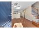 Inviting living room with hardwood floors, open layout, and staircase at 488 N Jeff Davis Dr, Fayetteville, GA 30214
