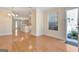 Open-concept living space showcasing hardwood floors and seamless flow into the kitchen at 488 N Jeff Davis Dr, Fayetteville, GA 30214