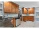 Updated kitchen featuring stainless steel appliances, granite countertops, and custom cabinetry at 23 Hunting Creek Dr, Marietta, GA 30068