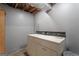 Basement laundry room features side by side washer and dryer hookups at 23 Hunting Creek Dr, Marietta, GA 30068
