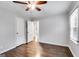 Inviting bedroom with hardwood floors, a ceiling fan, neutral walls and two closets for great storage at 1318 Beecher Sw St, Atlanta, GA 30310