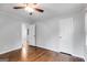 Spacious bedroom with wood floors, ceiling fan, and neutral walls, offering a calming atmosphere at 1318 Beecher Sw St, Atlanta, GA 30310