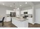 Stylish kitchen with white cabinets, granite countertops, and stainless steel appliances at 340 Mcgiboney Ln, Covington, GA 30016