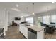 Open concept featuring kitchen island and view to living room at 340 Mcgiboney Ln, Covington, GA 30016
