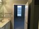 Bathroom view showing a sink and vanity with access to the bedroom at 175 Camry Ln, Grayson, GA 30017