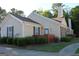 Cozy home featuring well manicured landscaping and a fenced in patio at 175 Camry Ln, Grayson, GA 30017