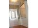 Warm, inviting foyer with a door, decorative molding and views into other rooms at 175 Camry Ln, Grayson, GA 30017
