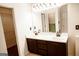 Bathroom boasts double sinks and a vanity offering a clean and modern space for daily routines at 110 Orchard Vw, Fayetteville, GA 30215